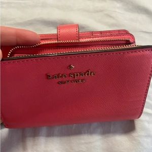 Kate Spade Pink wallet, no scratches or stains, buttons close